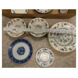 Collection of Blue and White Porcelain Plates, Bowls, and Accessories
