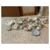 Collection of Vintage Miniature Porcelain Tea Sets and Decorative Dishes