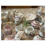 Collection of Vintage Miniature Porcelain Tea Sets and Decorative Dishes
