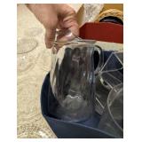 Collection of Vintage Glass and Porcelain Tableware Including Plates, Pitchers, and Decorative Dishes