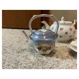 Collection of 6 Porcelain and Ceramic Teapots with Vintage Sugar Bowl