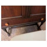 Vintage Wood Cabinet with Ornate Detailing and Drawer