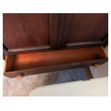 Vintage Wood Cabinet with Ornate Detailing and Drawer