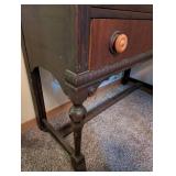 Vintage Wood Cabinet with Ornate Detailing and Drawer