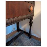 Vintage Wood Cabinet with Ornate Detailing and Drawer