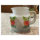 Collection of Porcelain Tea Cups, Decorative Pitchers, and Oriental Jar