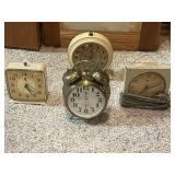 Collection of 4 Vintage Alarm Clocks Including Wind-Up and Electric