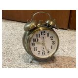Collection of 4 Vintage Alarm Clocks Including Wind-Up and Electric