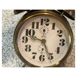 Collection of 4 Vintage Alarm Clocks Including Wind-Up and Electric