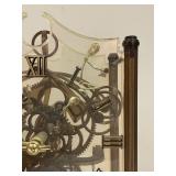 Vintage Skeleton Clock with Exposed Gears and Roman Numerals