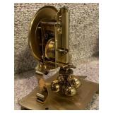 Pair of Brass Mantel Clocks Including Linden Westminster and Rotating Pendulum Clock