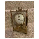 Pair of Brass Mantel Clocks Including Linden Westminster and Rotating Pendulum Clock