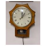 United Clock Corp Wall Clock with Roman Numerals and Pendulum