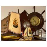 Collection of Nautical Decor with Model Boats and Ship Wheel Clocks