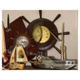 Collection of Nautical Decor with Model Boats and Ship Wheel Clocks