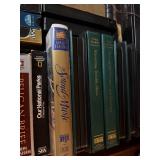 Box of VHS Tapes and Golf Books Including The Sound of Music, North to Alaska, Mastering Trouble Shots