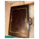 Antique Portable Phonograph with Native American Motif and Record Collection