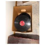 Antique Portable Phonograph with Native American Motif and Record Collection
