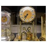 Collection of 4 Anniversary Mantel Clocks - Quartz Centurion, MYC, and Elgin