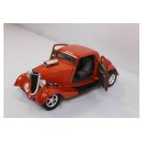 Die-Cast Model 1930s Orange Coupe Car with Removable Hood and Opening Doors Die-Cast Model 1930s Orange Coupe Car with Removable Hood and Opening Doors