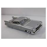 Die-Cast 1959 Cadillac Eldorado Biarritz Model Car Silver with Opening Doors and Hood Die-Cast 1959 Cadillac Eldorado Biarritz Model Car Silver with Opening Doors and Hood