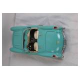 Die-Cast 1957 Chevrolet Corvette Model Car Blue and White Die-Cast 1957 Chevrolet Corvette Model Car Blue and White