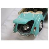 Die-Cast 1957 Chevrolet Corvette Model Car Blue and White Die-Cast 1957 Chevrolet Corvette Model Car Blue and White
