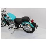 Die-Cast Harley-Davidson Motorcycle Model in Teal and Black Die-Cast Harley-Davidson Motorcycle Model in Teal and Black