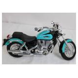 Die-Cast Harley-Davidson Motorcycle Model in Teal and Black Die-Cast Harley-Davidson Motorcycle Model in Teal and Black