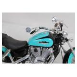 Die-Cast Harley-Davidson Motorcycle Model in Teal and Black Die-Cast Harley-Davidson Motorcycle Model in Teal and Black