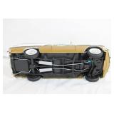 Gold Diecast Model Car with Opening Doors and Detailed Undercarriage Gold Diecast Model Car with Opening Doors and Detailed Undercarriage