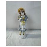 Porcelain Figurine of Girl in Blue Dress with Basket Porcelain Figurine of Girl in Blue Dress with Basket