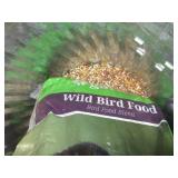 Metal trash can with lid containing... Metal trash can with lid containing...