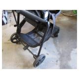 Modes folding up baby stroller... Modes folding up baby stroller...