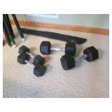 Lot of pool cues and assorted weigh... Lot of pool cues and assorted weigh...