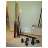 Lot of pool cues and assorted weigh... Lot of pool cues and assorted weigh...