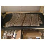 Entire contents of shelf, totes rug... Entire contents of shelf, totes rug...