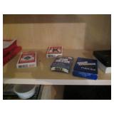 Oak cabinet filled with games and c... Oak cabinet filled with games and c...
