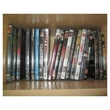 Oak cabinet filled with DVDs measur... Oak cabinet filled with DVDs measur...