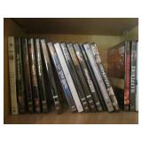 Oak cabinet filled with DVDs measur... Oak cabinet filled with DVDs measur...