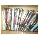 Oak cabinet filled with DVDs measur... Oak cabinet filled with DVDs measur...