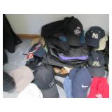 A collection of baseball caps, hats... A collection of baseball caps, hats...