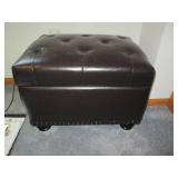 A black leather type storage trunk ... A black leather type storage trunk ...
