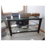Small glass tv stand with contents... Small glass tv stand with contents...