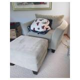 Oversized neutral ton upholstered c... Oversized neutral ton upholstered c...