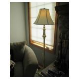 Freestanding brass-tone floor lamp ... Freestanding brass-tone floor lamp ...