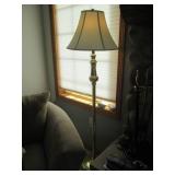 Freestanding brass-tone floor lamp ... Freestanding brass-tone floor lamp ...