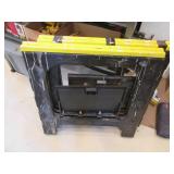 Pair of plastic saw horses with tab... Pair of plastic saw horses with tab...