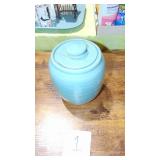UND Pottery Cookie Jar (asis) Lid has a Crack and base has a hairline in it. UND Pottery Cookie Jar (asis) Lid has a Crack and base has a hairline in it.