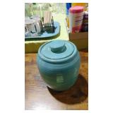 UND Pottery Cookie Jar (asis) Lid has a Crack and base has a hairline in it. UND Pottery Cookie Jar (asis) Lid has a Crack and base has a hairline in it.